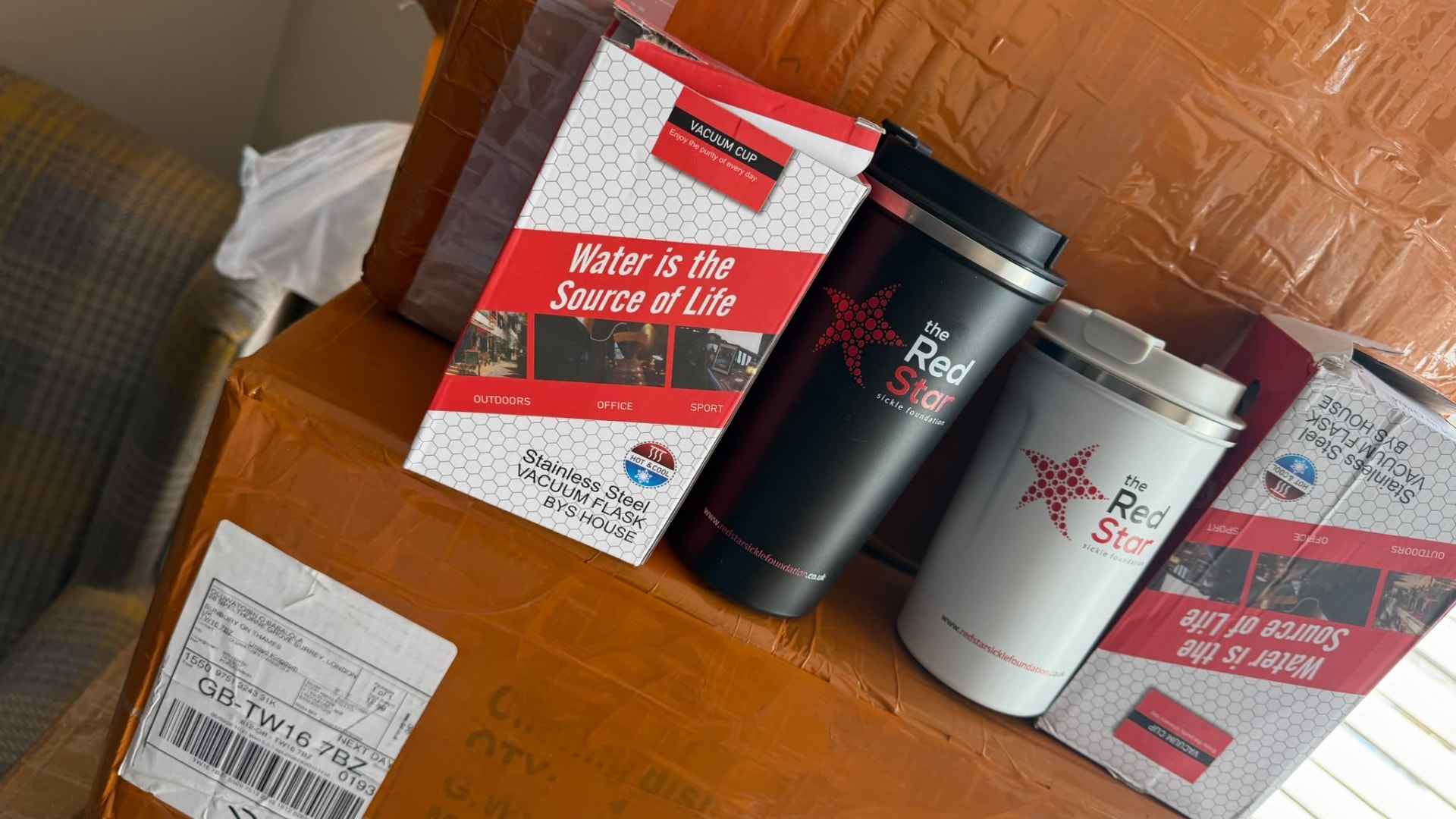 Travel tumblers printed with a charity logo